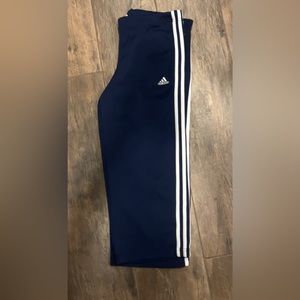 Adidas navy blue small ankle track pants.